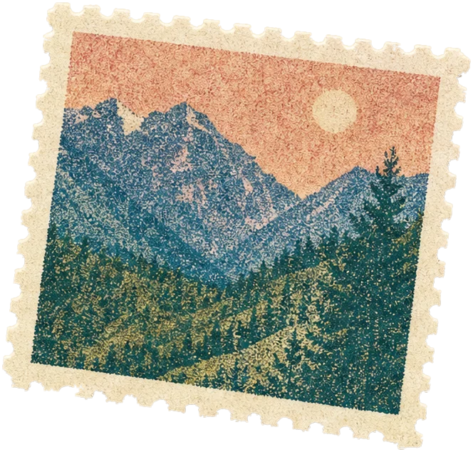 Paper cutout of a postage stamp showing mountains at dusk